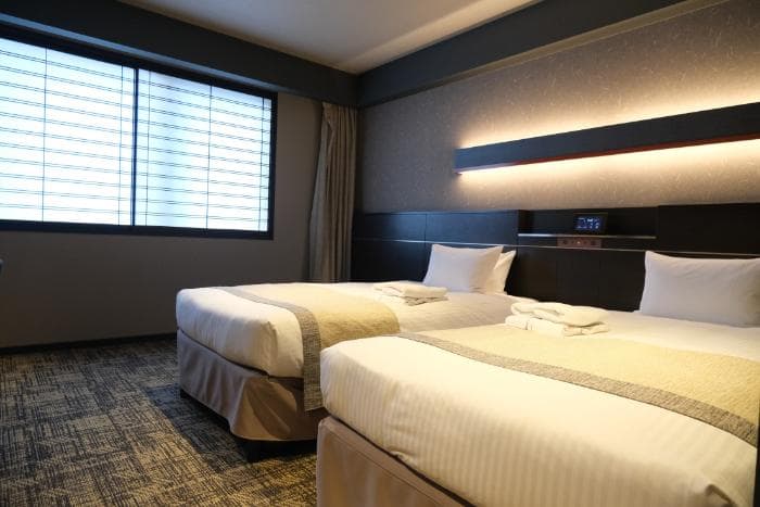 「ホテル京阪 京都八条口」ポケットコイルマットレスのベッド